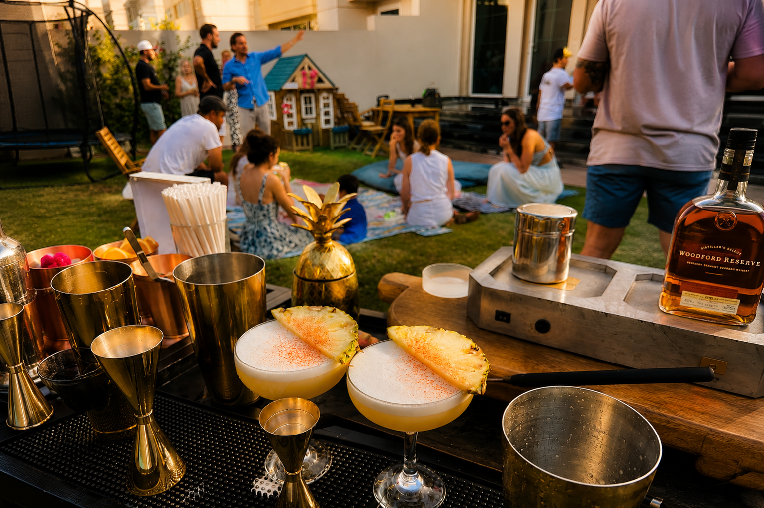 Pineapple garnished cocktails on a private event bar